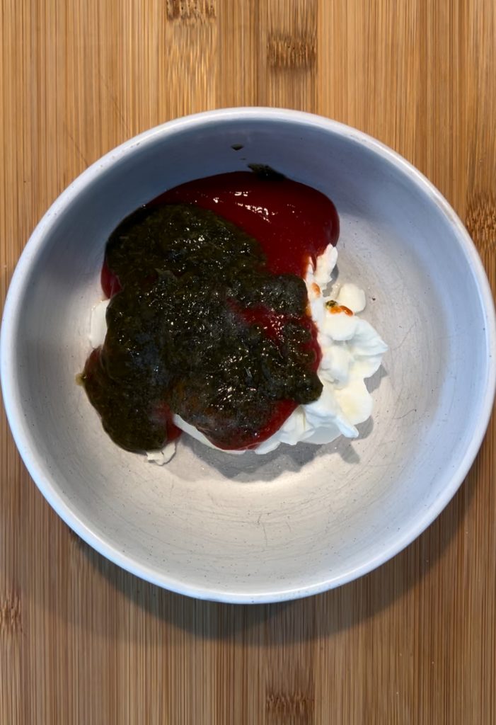 150 g thick plain yoghurt, 60 g tomato ketchup, 3 teaspoon mint sauce, ½ teaspoon chilli powder and pinch of salt