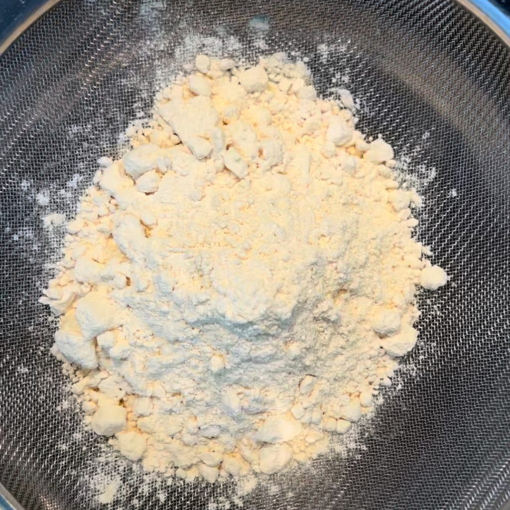 gram flour in sieve