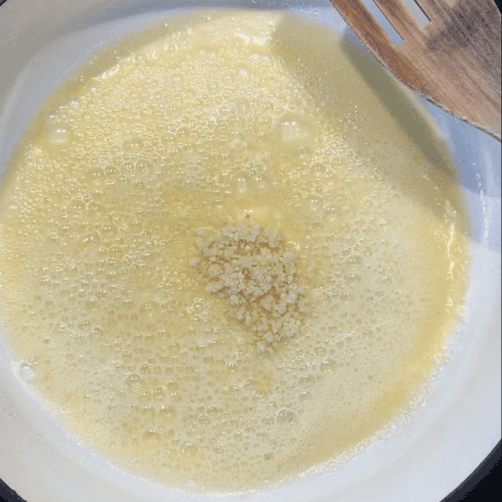 butter and garlic in pan