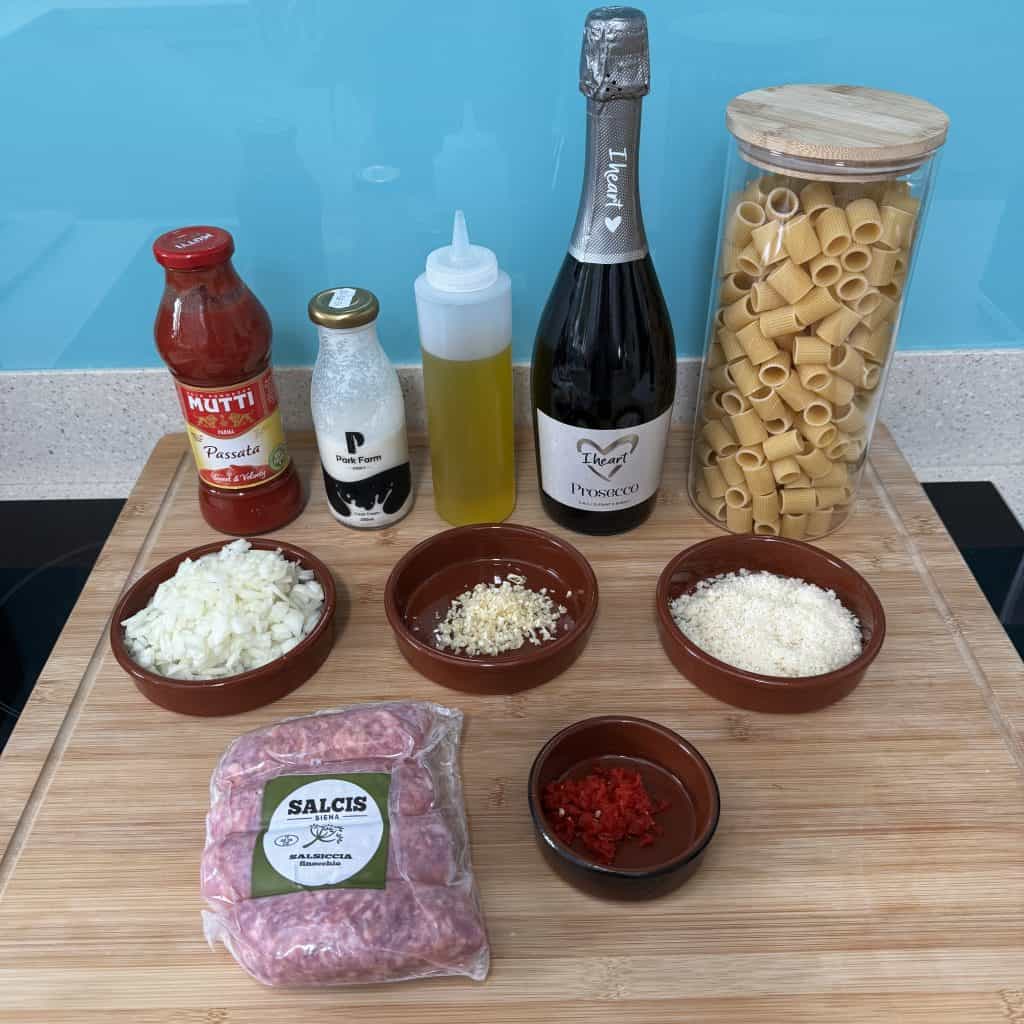 ingredients for processo pasta displayed on wooden board