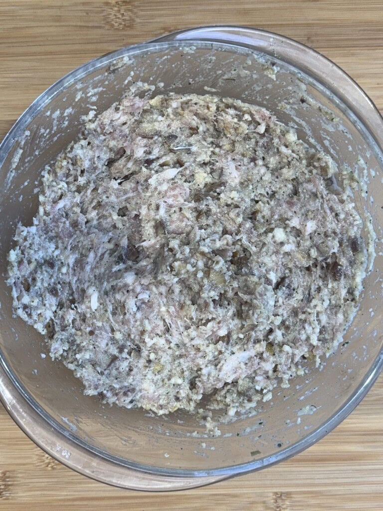 A bowl of food on a table.